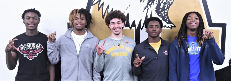 Five Abilene High football players were part of a college signing ceremony on Friday at Abilene High. Pictured, from left, is Kenneth Johnson (McMurry), Jayson Henley (Angelo State), Noah Hatcher (Midwestern State), Tim Outlaw (Hardin-Simmons) and Kwame Collins (Angelo State).
