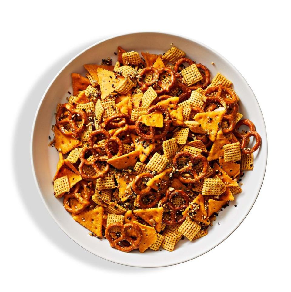 <p>In addition to a perfect pre-meal snack, this savory mix is completely customizable: Add in parmesan cheese, nuts or any spices your heart desires to create your ideal salty concoction. </p><p>Get the <strong><a href="https://www.goodhousekeeping.com/food-recipes/a38553337/spiced-snack-mix-recipe/" rel="nofollow noopener" target="_blank" data-ylk="slk:Spiced Snack Mix recipe;elm:context_link;itc:0;sec:content-canvas" class="link ">Spiced Snack Mix recipe</a></strong>. </p><p><strong>RELATED: </strong><a href="https://www.goodhousekeeping.com/food-recipes/easy/g122/easy-appetizers/" rel="nofollow noopener" target="_blank" data-ylk="slk:50+ Easy Appetizers and Snacks to Get the Party Started;elm:context_link;itc:0;sec:content-canvas" class="link ">50+ Easy Appetizers and Snacks to Get the Party Started</a></p>