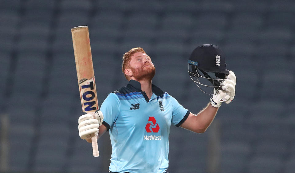 England batsman Jonathan Bairstow celebrates his century during the 2nd One Day International between India and England at MCA Stadium on March 26, 2021 in Pune, India.