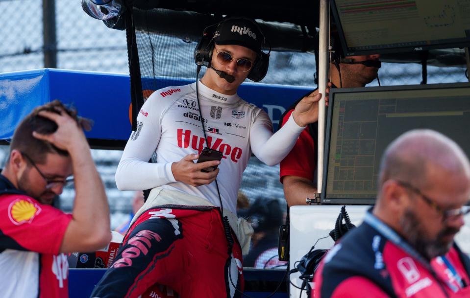 Rahal Letterman Lanigan Racing driver Christian Lundgaard (45) prepares to enter his car Friday, Aug. 11, 2023, ahead of practice for the Gallagher Grand Prix at Indianapolis Motor Speedway. 
