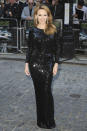 Also spotted looking lovely in black this week was Aussie pop tart, Kylie Minogue, who oozed glamour at the U.K. debut of <a href="http://movies.yahoo.com/movie/holy-motors/" data-ylk="slk:"Holy Motors";elm:context_link;itc:0;sec:content-canvas" class="link ">"Holy Motors"</a> in a long-sleeve, sequined Dolce & Gabbana gown and dripping diamond earrings, courtesy of De Beers. (9/18/2012)<br><br><a href="http://omg.yahoo.com/blogs/jam/" data-ylk="slk:Jam: Spotlight on Music Stars;elm:context_link;itc:0;sec:content-canvas" class="link ">Jam: Spotlight on Music Stars<br></a>