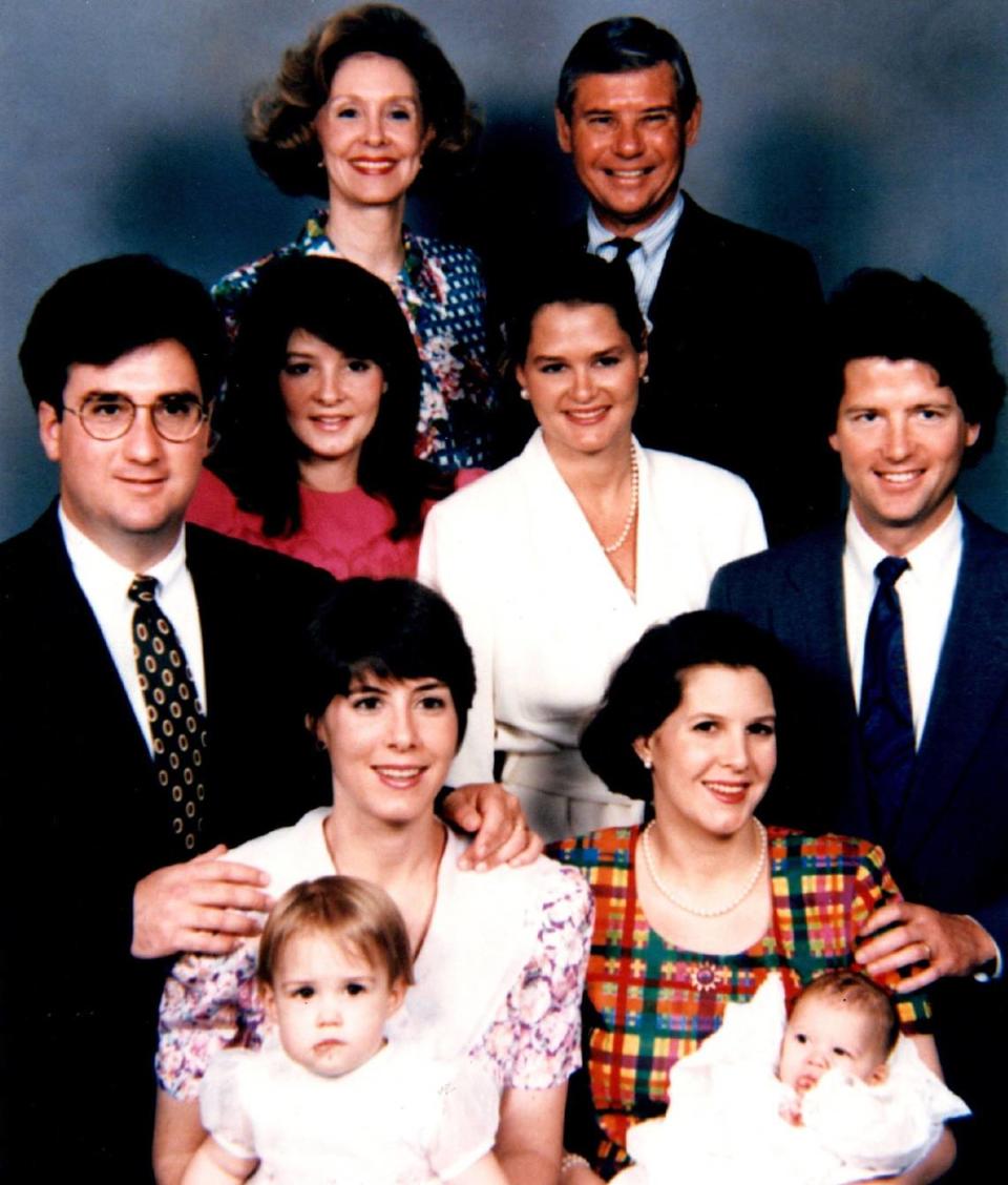 6/17/1992: Provided to The Miami Herald -- Portrait of U.S. Sen. Bob Graham and family. From left to right, top to bottom: Adele Graham and Sen. Bob Graham; Kendall Graham (pink dress); Suzanne Graham (white dress); Gwen Logan (white and pink flowered dress); Cissy McCullough (plaid dress). Men and children are not identified.