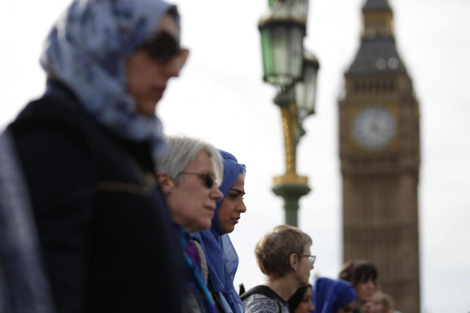 Activists: The women held hands along the bridge (AFP/Getty Images)