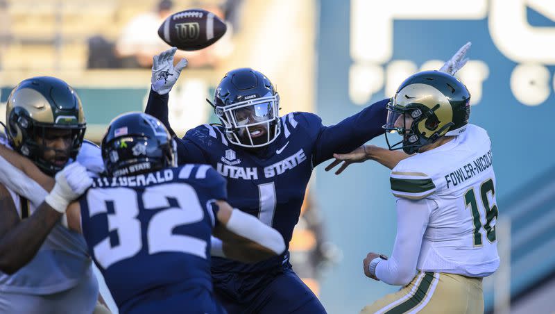 Utah State safety/linebacker Anthony Switzer (1) announced on X, the social media platform formerly known as Twitter, that he will be returning to Utah State next season.