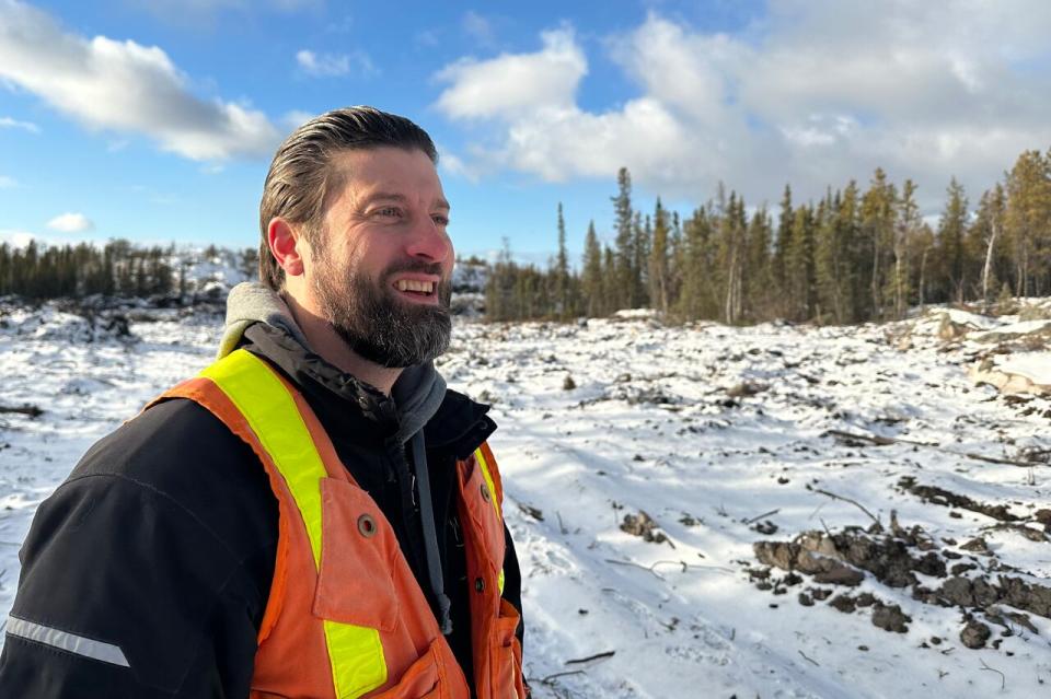 Chris Greencorn, Yellowknife's director of public works, stands on the access route to the firebreak near Grace Lake Boulevard. He expects the city will talk about long-term plans for the hastily built firebreaks during budget deliberations in the new year. 