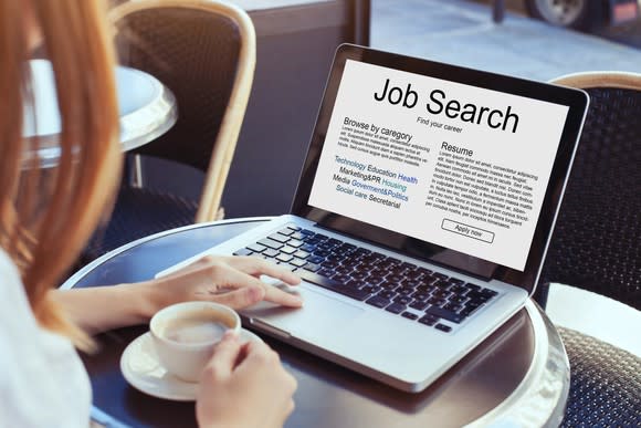 Job search on laptop screen.