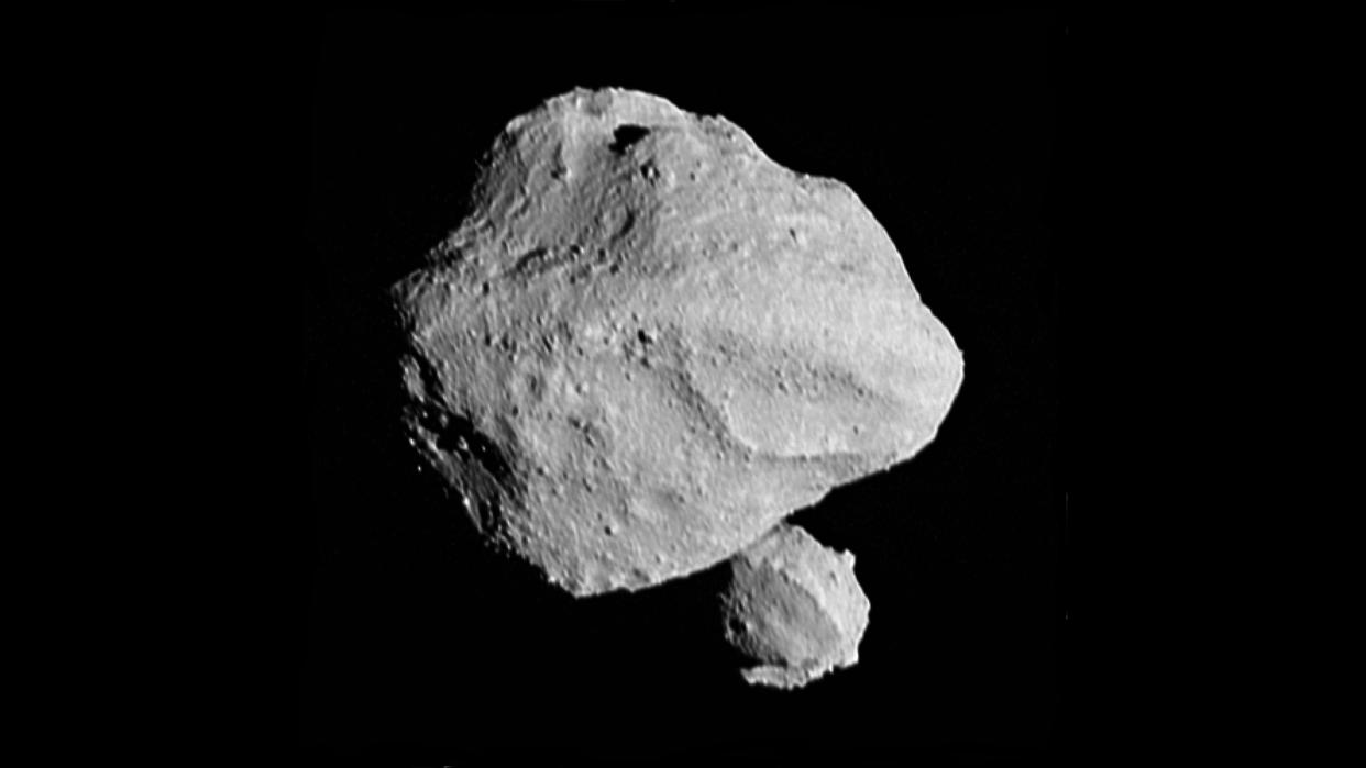  This image shows the "moonrise" of the satellite as it emerges from behind asteroid Dinkinesh as seen by the Lucy Long-Range Reconnaissance Imager (L'LORRI), one of the most detailed images returned by NASA's Lucy spacecraft during its flyby of the asteroid binary. This image was taken at 12:55 p.m. EDT (1655 UTC) Nov. 1, 2023, within a minute of closest approach, from a range of approximately 270 miles (430 km). From this perspective, the satellite is behind the primary asteroid. 