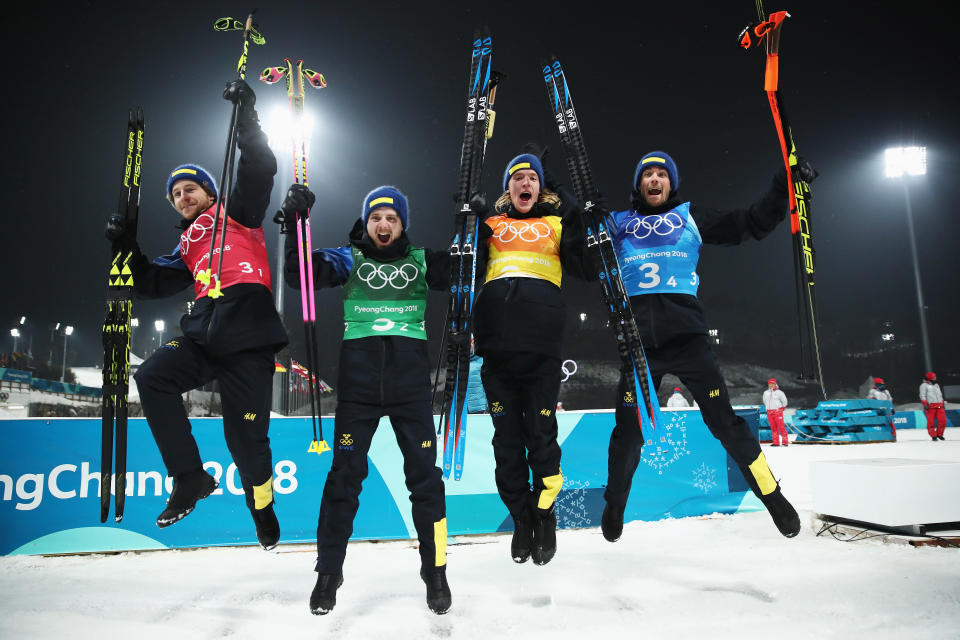 <p>(L-R) Gold medalists Peppe Femling, Jesper Nelin, Sebastian Samuelsson, and Fredrik Lindstroem of Sweden celebrate during the victory ceremony for the Men’s 4×7.5km Biathlon Relay on day 14 of the PyeongChang 2018 Winter Olympic Games on February 23, 2018 in South Korea.<br> (Photo by Clive Mason/Getty Images) </p>