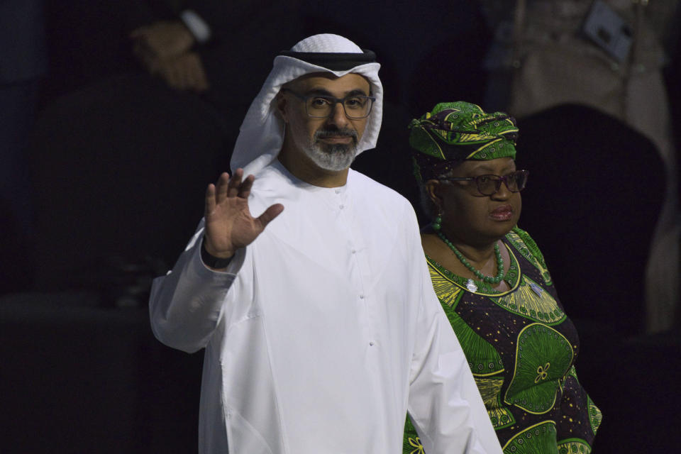 Abu Dhabi Crown Prince Sheikh Khaled bin Mohammed Al Nahyan, left, and World Trade Organization Director-General Ngozi Okonjo-Iweala walk into a summit in Abu Dhabi, United Arab Emirates, Monday, Feb. 26, 2024. The World Trade Organization opened its biennial meeting Monday in the United Arab Emirates as the bloc faces pressure from the United States and other nations ahead of a year of consequential elections around the globe. (AP Photo/Jon Gambrell)