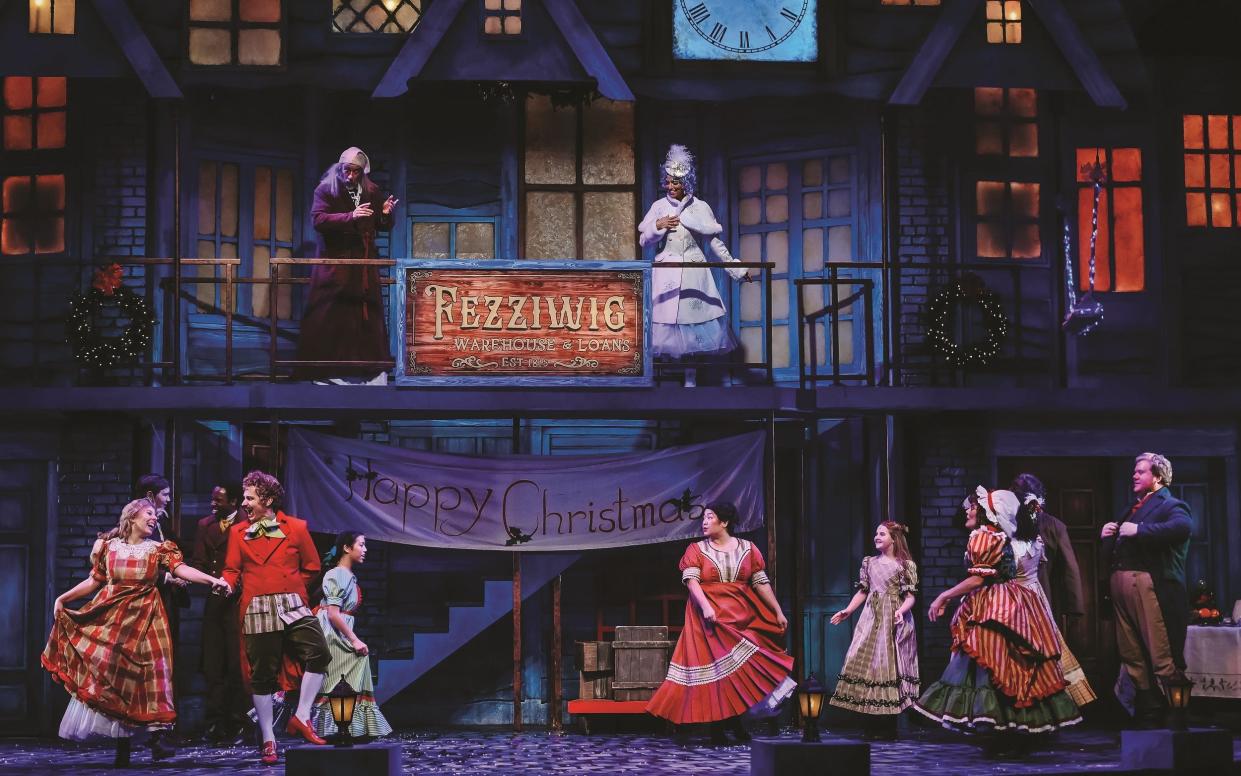 The cast of Lyric Theatre's new production of "A Christmas Carol" performs at the Plaza Theatre.