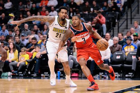 Oct 23, 2017; Denver, CO, USA; Denver Nuggets forward Wilson Chandler (21) guards Washington Wizards guard Bradley Beal (3) in the fourth quarter at the Pepsi Center. Mandatory Credit: Isaiah J. Downing-USA TODAY Sports