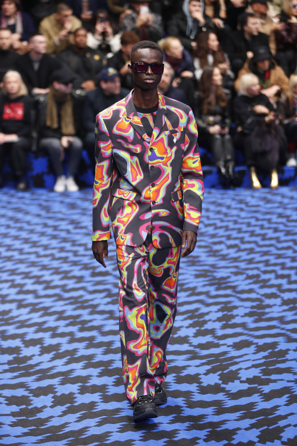 A model wears a creation as part of the Marcelo Burlon men's Fall-Winter 2020/21 collection, that was presented in Milan, Italy, Saturday, Jan. 11, 2020. (AP Photo/Antonio Calanni)