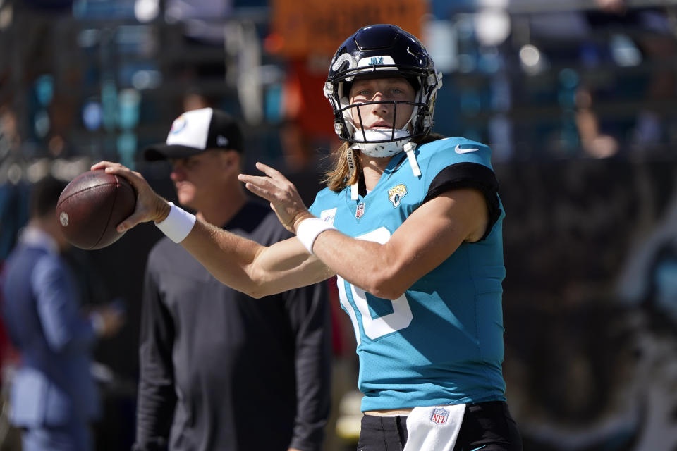 Jacksonville Jaguars quarterback Trevor Lawrence (16) warms up before an NFL football game against the New York Giants Sunday, Oct. 23, 2022, in Jacksonville, Fla. (AP Photo/John Raoux)