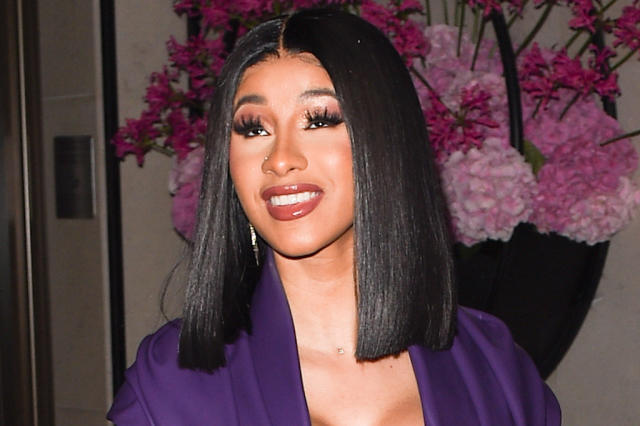 Cardi B Printed Ponytail: Louis Vuitton Logo Hairstyle