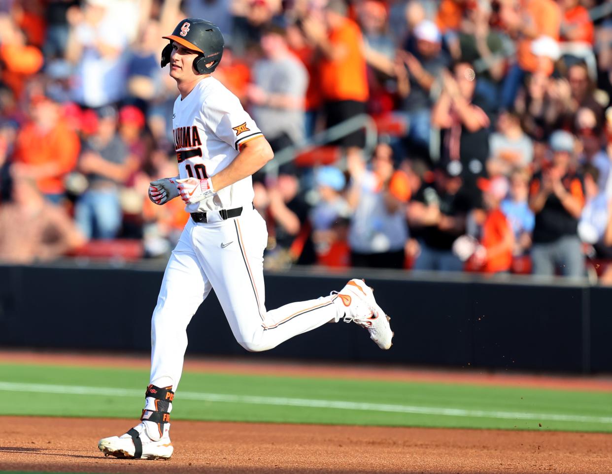 Oklahoma State's Nolan Schubart (10) rounds the bases after a home run in the first inning during the college Bedlam baseball game between Oklahoma State University Cowboys and the University of Oklahoma Sooners at O'Brate Stadium in Stillwater, Okla., Friday, April 5, 2024.