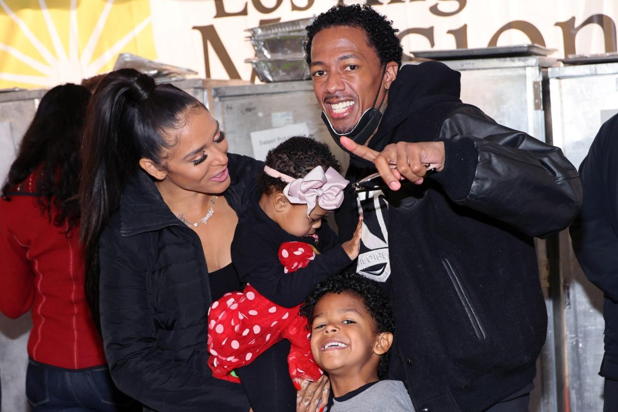 LOS ANGELES, CALIFORNIA - DECEMBER 23: Brittany Bell, Nick Cannon and children Powerful Queen Cannon and Golden Cannon attend the Los Angeles Mission's Annual Christmas Celebration at the Los Angeles Mission on December 23, 2022 in Los Angeles, California. (Photo by David Livingston/Getty Images)