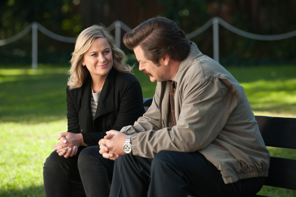 PARKS AND RECREATION -- "One Last Ride" Episode 712/713 -- Pictured: (l-r) Amy Poehler as Leslie Knope, Nick Offerman as Ron Swanson -- (Photo by: Colleen Hayes/NBCU Photo Bank/NBCUniversal via Getty Images via Getty Images)