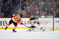 Philadelphia Flyers' Travis Konecny (11) scores a goal past Boston Bruins goaltender Jaroslav Halak in a shootout during an NHL hockey game, Monday, Jan. 13, 2020, in Philadelphia. The Flyers won 6-5. (AP Photo/Derik Hamilton)