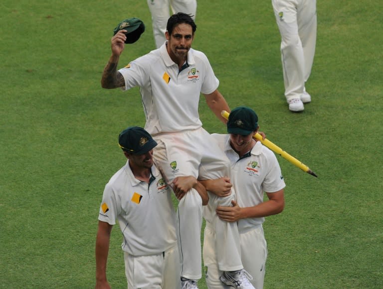 Australia's Mitchell Johnson is carried off at the end of the final day of the second Test match against New Zealand in Perth, on November 17, 2015