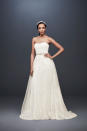 <p>Strapless embroidered dress. (Photo: Courtesy of David’s Bridal) </p>