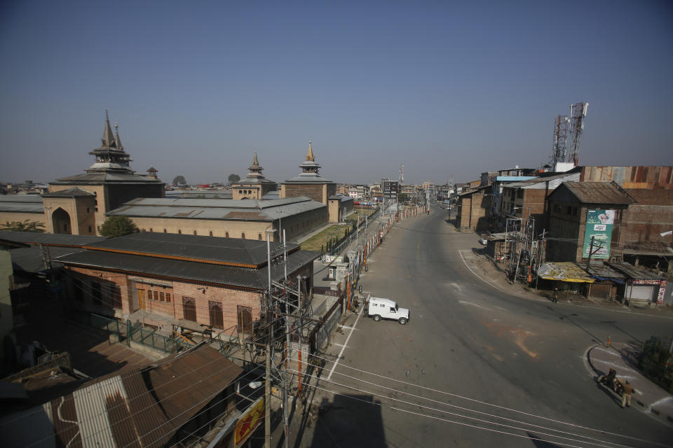 An Indian paramilitary vehicle is parked outside the Jamia Masjid or Grand Mosque in Srinagar, Indian controlled Kashmir, Monday, Oct. 22, 2018. Armed soldiers and police have fanned out across much of Indian-controlled Kashmir as separatists challenging Indian rule called for a general strike to mourn the deaths of civilians and armed rebels during confrontation with government forces. (AP Photo/Mukhtar Khan)