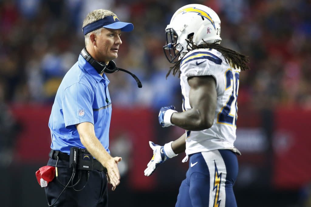 Oct 23, 2016; Atlanta, GA, USA; San Diego Chargers head coach Mike McCoy congratulates running back Melvin Gordon (28) after a touchdown against the Atlanta Falcons in the fourth quarter at the Georgia Dome. The Chargers defeated the Falcons 33-30 in overtime. Mandatory Credit: Brett Davis-USA TODAY Sports