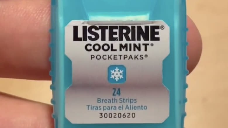 listerine pocketpaks on fingers
