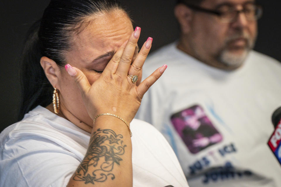 Zoraida Garcia, speaks at a press conference about her nephew Eddie Irizarry, the 27-year-old man shot and killed by a Philadelphia police officer, at the Law Offices of Shaka Johnson, LLC, in Philadelphia Tuesday, Aug. 22, 2023. (Jessica Griffin/The Philadelphia Inquirer via AP)