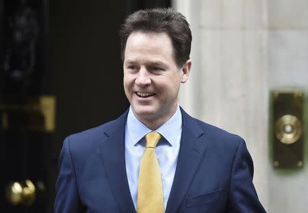 Britain's Deputy Prime Minister Nick Clegg leaves Number 10 Downing Street, as he heads to Buckingham Palace to meet with Queen Elizabeth, in central London March 30, 2015. March 30, 2015. REUTERS/Toby Melville