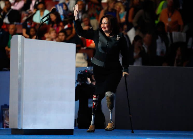 Tammy Duckworth waves to supporters