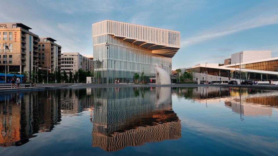 Oslo's new Deichman Bjørvika Public Library features a bold cantilevered facade that juts out over the city's waterfront. 