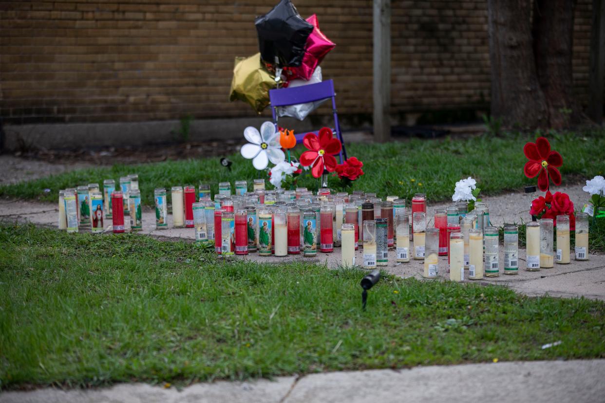 Candles, balloons and flowers are seen on Wednesday, May 4, 2022, in the 900 block of Grant Avenue as part of a memorial for a 31-year-old man who was shot and killed April 27 at the Grant Avenue residence.
