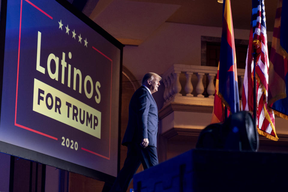 FILE - In this Sept. 14, 2020 file photo, President Donald Trump arrives for a Latinos for Trump Coalition roundtable at Arizona Grand Resort & Spa in Phoenix. (AP Photo/Andrew Harnik, File)