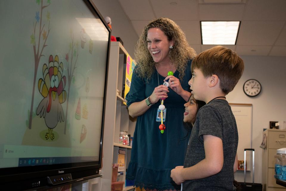 Shannon Haddad working with students at Ashton Elementary School.