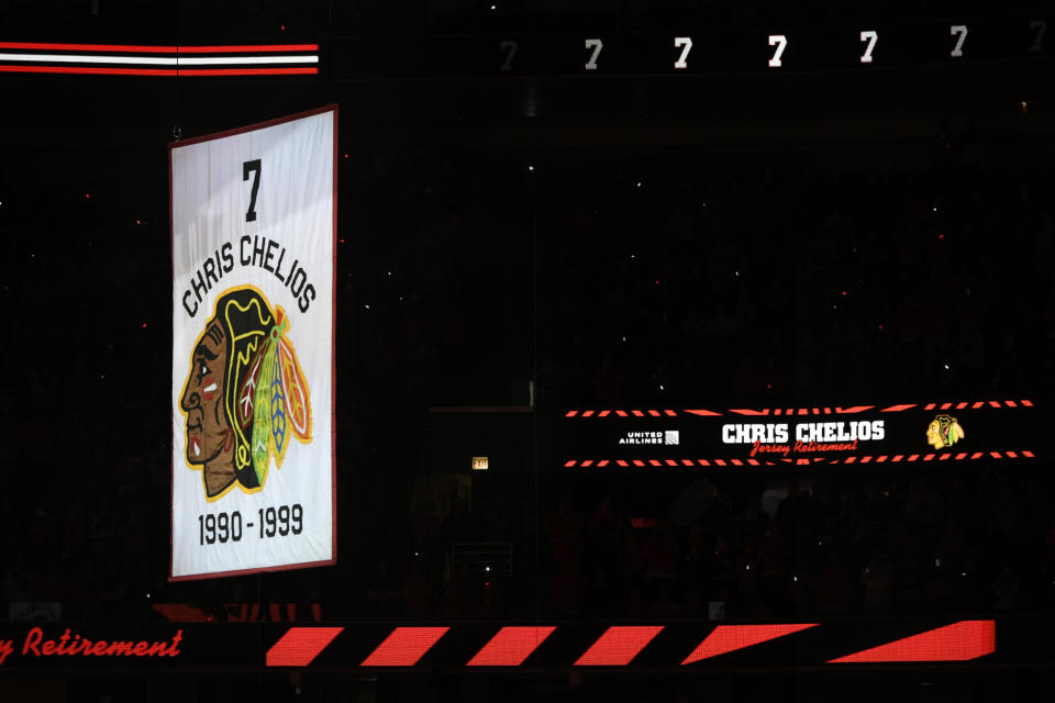 Former Chicago Blackhawks great Chris Chelios has his jersey retired during a ceremony before an NHL hockey game between the Chicago Blackhawks and Detroit Red Wings Sunday, Feb. 25, 2024, in Chicago. (AP Photo/Paul Beaty)