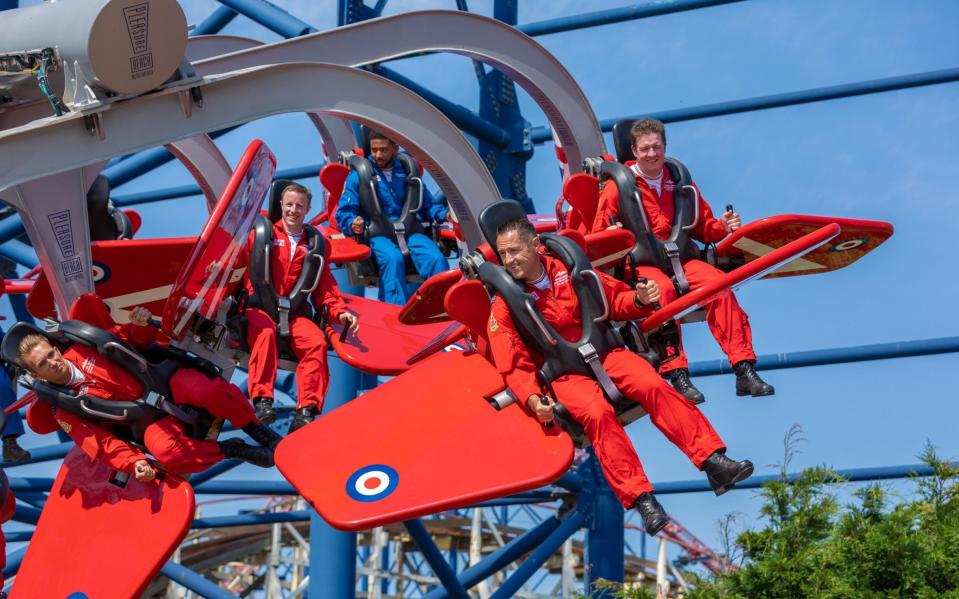 Red Arrows pilots try out the ride named after their aerial acrobatic team at Blackpool Pleasure Beach - Blackpool Pleasure Beach / SWNS