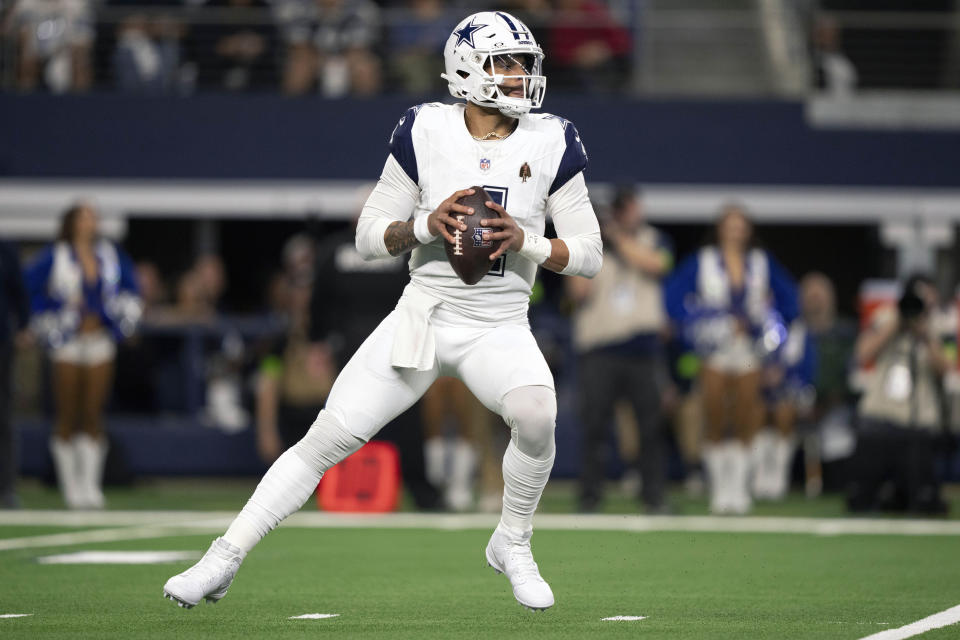 FILE - Dallas Cowboys quarterback Dak Prescott drops back to pass during an NFL football game against the Philadelphia Eagles in Arlington, Texas, Sunday, Dec. 10, 2023. Dad Prescott is a finalist for The Associated Press 2023 NFL Most Valuable Player and Offensive Player of the Year awards. The winners will be announced at NFL Honors on Feb. 8.(AP Photo/Tony Gutierrez, File)