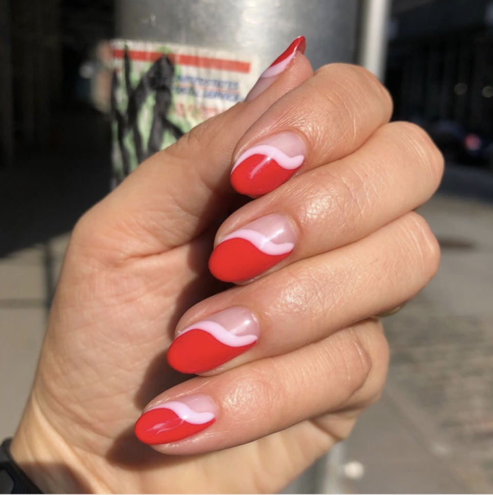 <p>For a more minimalist take on the 4th, check out this graphic wave in shades of red and white. It's a trendy look that you can rock all summer long. </p><p><a class="link " href="https://go.redirectingat.com?id=74968X1596630&url=https%3A%2F%2Fwww.etsy.com%2Flisting%2F235261445%2Fwavy-nail-stencil-1%3Fga_order%3Dmost_relevant%26ga_search_type%3Dall%26ga_view_type%3Dgallery%26ga_search_query%3Dwavy%2Bnail%2Bdecals%26ref%3Dsr_gallery-1-1%26organic_search_click%3D1%26frs%3D1&sref=https%3A%2F%2Fwww.oprahdaily.com%2Fbeauty%2Fg27727694%2Ffourth-of-july-nail-ideas%2F" rel="nofollow noopener" target="_blank" data-ylk="slk:SHOP STENCIL;elm:context_link;itc:0;sec:content-canvas">SHOP STENCIL</a></p>