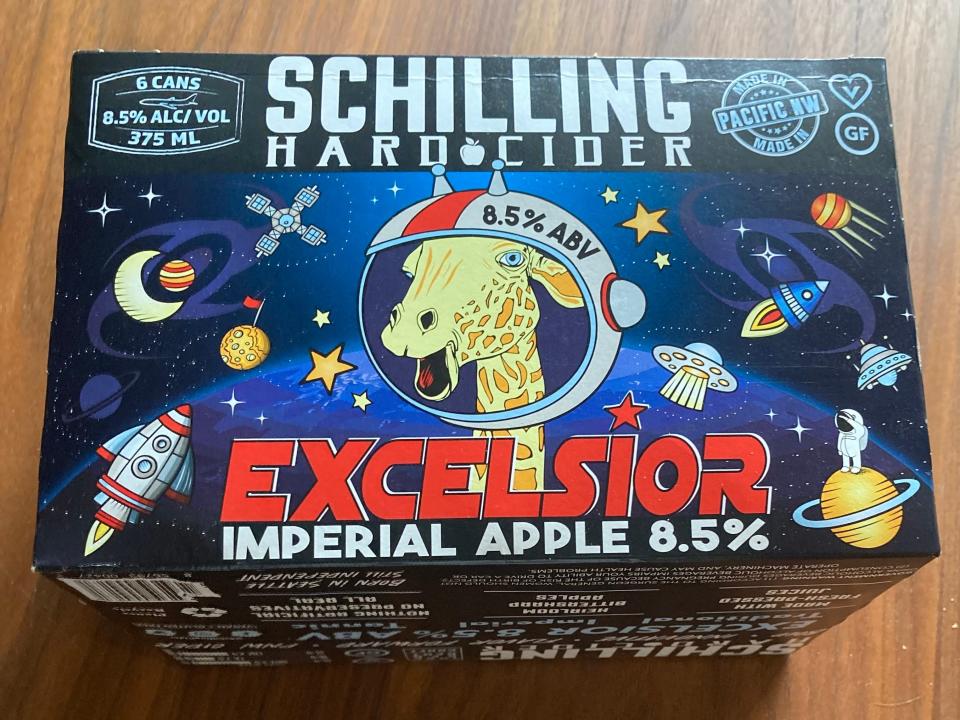 Colorful, space-themed pack of Schilling's hard cider (found at Costco) on wooden floor