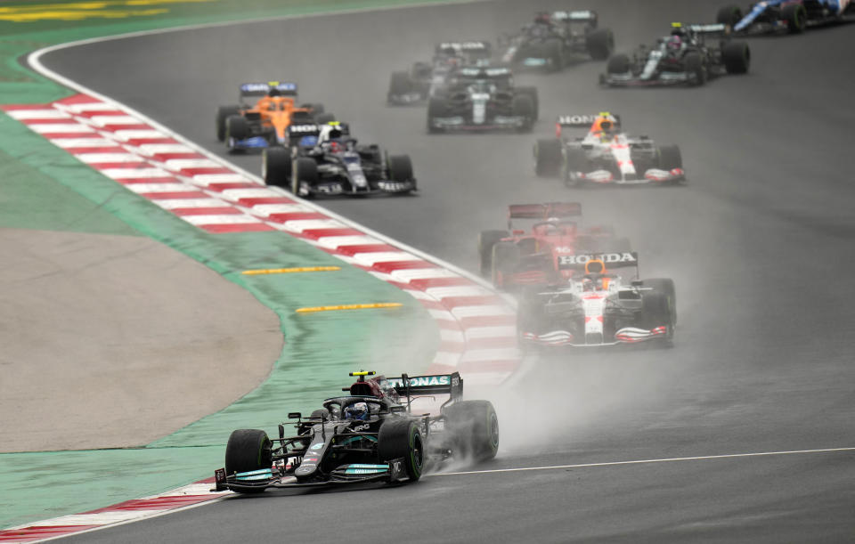 Mercedes driver Valtteri Bottas of Finland leads at the start of the Turkish Formula One Grand Prix at the Intercity Istanbul Park circuit in Istanbul, Turkey, Sunday, Oct. 10, 2021. (AP Photo/Francisco Seco)