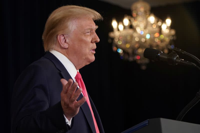 U.S. President Donald Trump speaks during a news conference at his golf resort in Bedminster