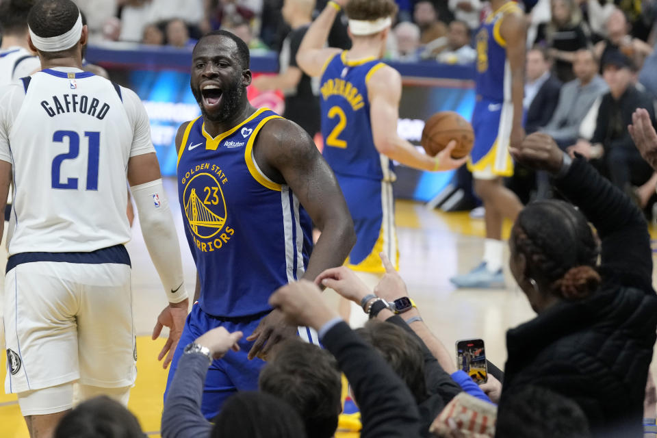 Golden State Warriors forward Draymond Green (23) reacts toward fans during the second half of the team's NBA basketball game against the Dallas Mavericks in San Francisco, Tuesday, April 2, 2024. (AP Photo/Jeff Chiu)