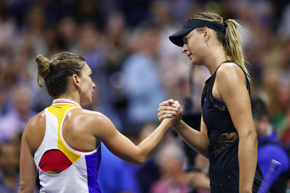 <p>Maria Sharapova (R) of Russia shakes hands with Simona Halep of Romania after defeating her in their first round Women’s Singles match on Day One of the 2017 US Open at the USTA Billie Jean King National Tennis Center on August 28, 2017 in the Flushing neighborhood of the Queens borough of New York City. (Photo by Clive Brunskill/Getty Images) </p>