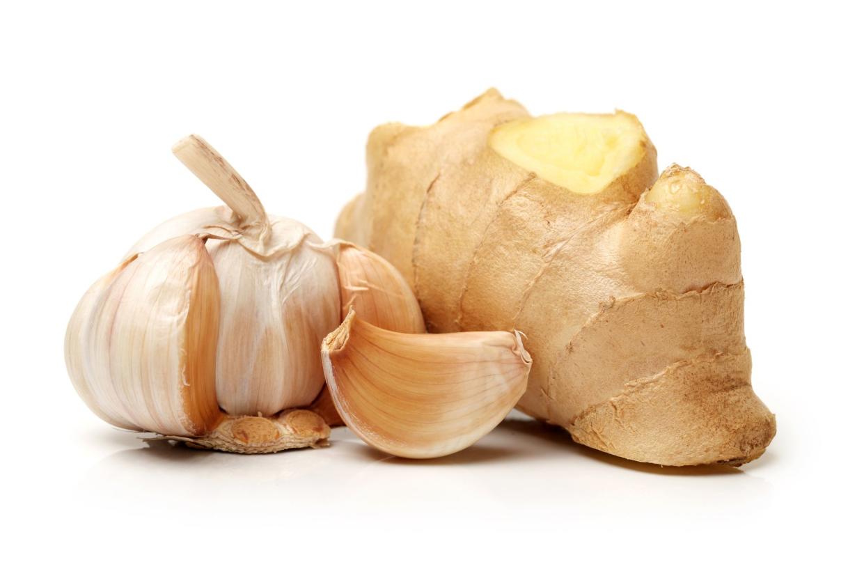 Ginger and Garlic on white background.