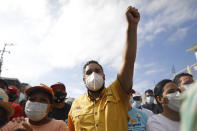 Nicolas Maduro Guerra, son of Venezuela's President Nicolas Maduro, campaigns for a spot in the National Assembly for the upcoming Dec. 6 midterm elections, in Maiquetía, Venezuela, Sunday, Nov. 29, 2020. (AP Photo/Ariana Cubillos)