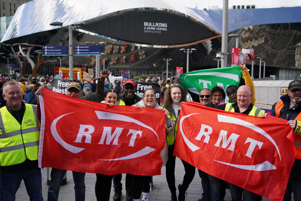 File photo dated 01/10/2022 of rail workers on a picket line at Birmingham New Street Station, as rail union chiefs have been urged to 