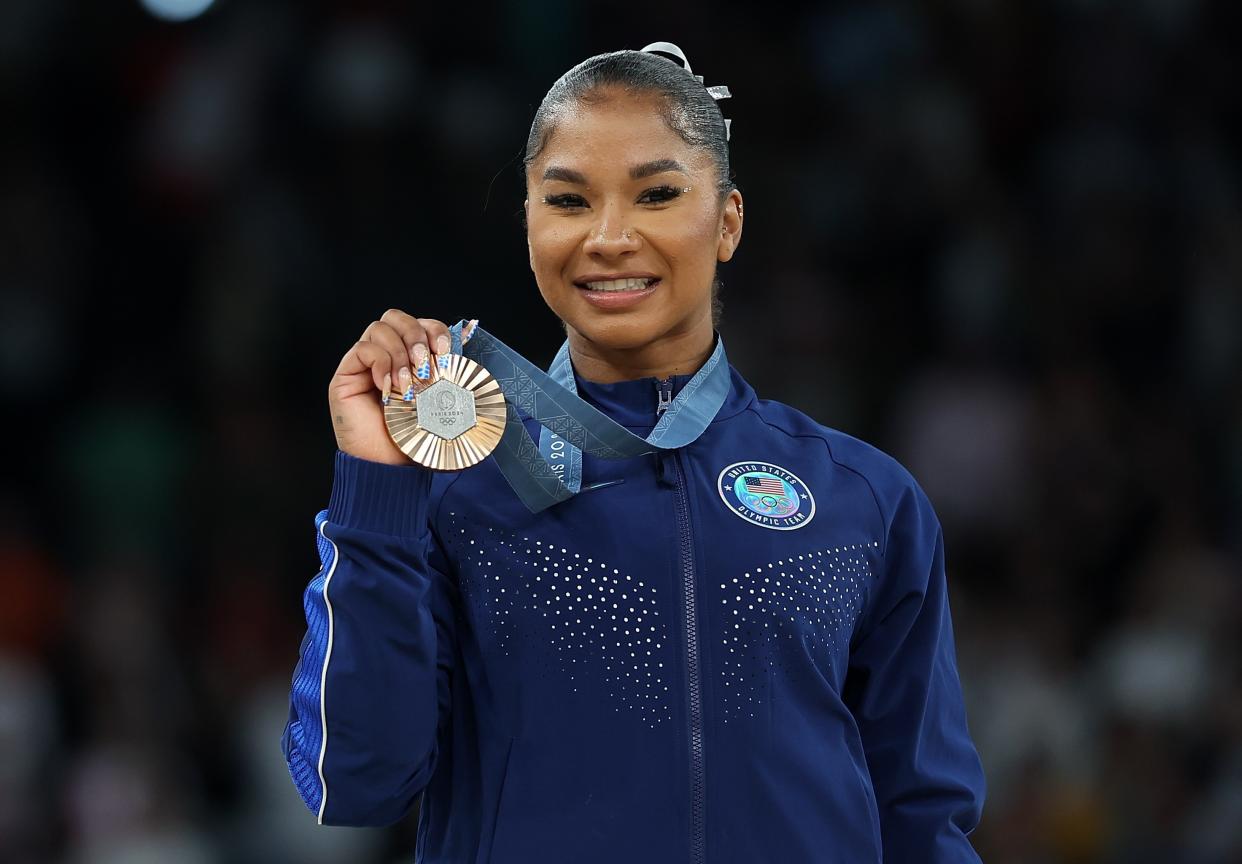 Bronze medalist Jordan Chiles of the United States poses for photos during the victory ceremony of women's floor exercise of artistic gymnastics at the Paris 2024 Olympic Games in Paris, France, Aug. 5, 2024. (Photo by Cao Can/Xinhua via Getty Images)