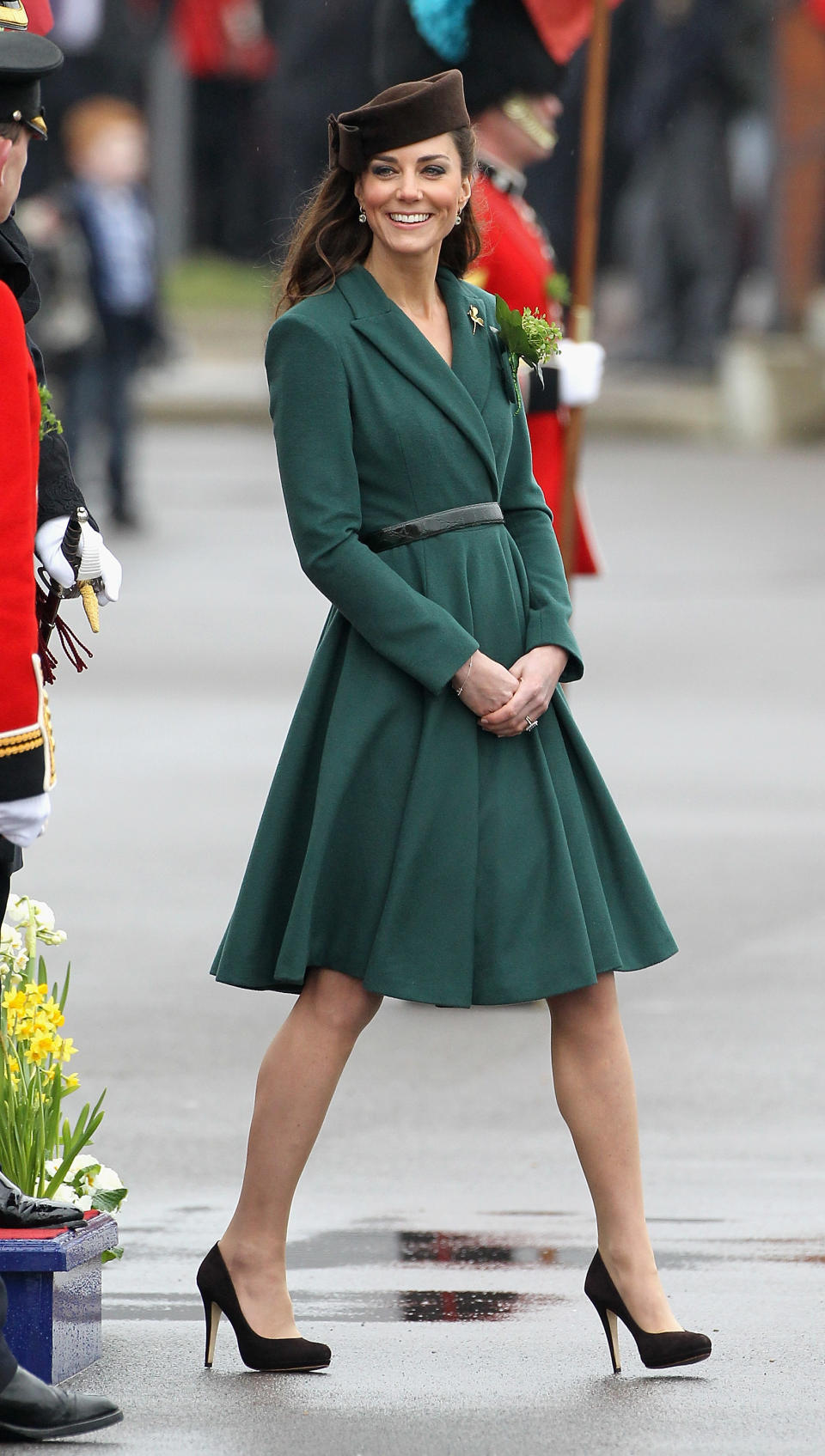 ALDERSHOT, ENGLAND - MARCH 17: Catherine, Duchess of Cambridge takes part in a St Patrick's Day parade as she visits Aldershot Barracks on St Patrick's Day on March 17, 2012 in Aldershot, England. The Duchess presented shamrocks to the Irish Guards at a St Patrick's Day parade during her visit. (Photo by Chris Jackson/Getty Images)