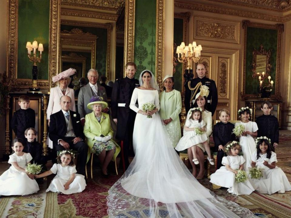 Prince Harry and Meghan Markle with (left-to-right): Back row: Master Jasper Dyer, Her Royal Highness The Duchess of Cornwall, His Royal Highness The Prince of Wales, Ms. Doria Ragland, His Royal Highness The Duke of Cambridge. Middle row: Master Brian Mulroney, His Royal Highness The Duke of Edinburgh, Her Majesty The Queen, Her Royal Highness The Duchess of Cambridge, Her Royal Highness Princess Charlotte, His Royal Highness Prince George, Miss Rylan Litt, Master John Mulroney. Front row: Miss Ivy Mulroney, Miss Florence van Cutsem, Miss Zalie Warren, Miss Remi Litt