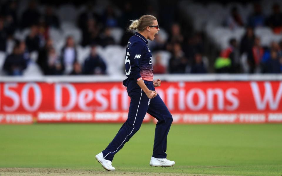 England's Alex Hartley celebrates the wicket of India's Sushma Verma - Credit: PA